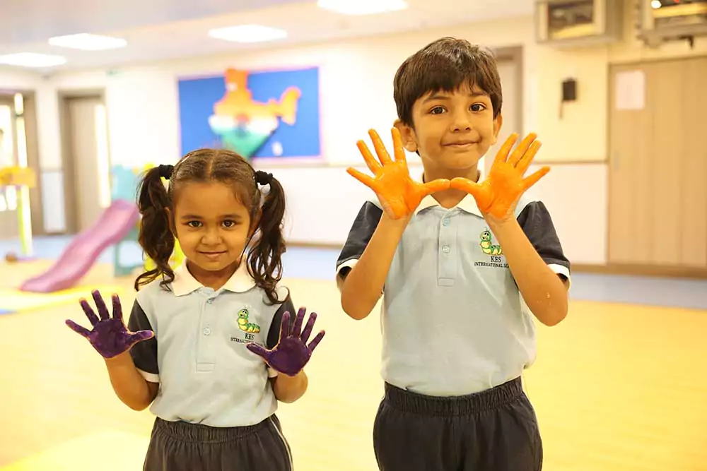 Students of kes International School are painting