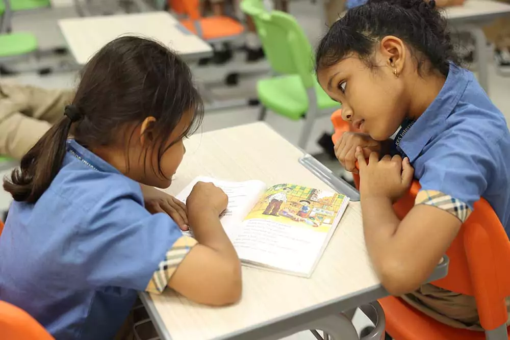 Students of kes International School are reading books