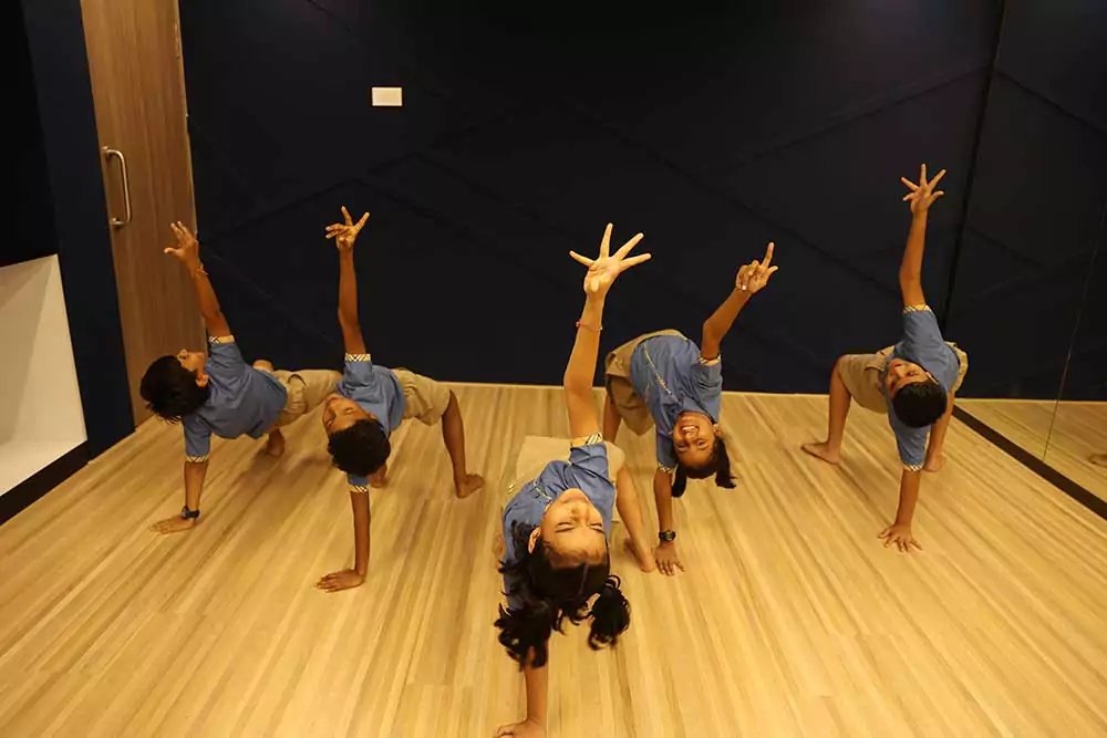 Students of KES International school practicing dance moves