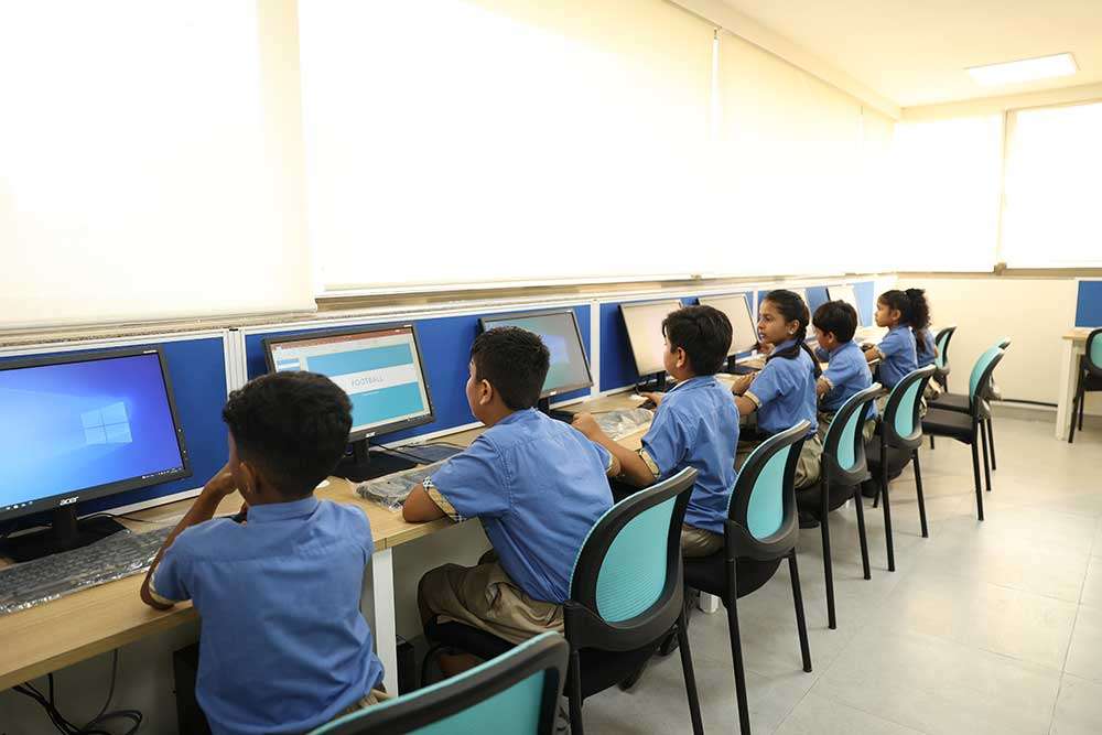 Students of KES International school undergoing computer training